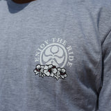 HIC ENJOY THE RIDE Banner Day T-Shirt featuring a colorful graphic design and casual fit, worn by a model.