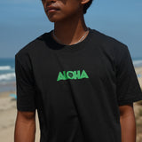 HIC ENJOY THE RIDE Secret Aloha T-Shirt featuring a colorful tropical design on soft fabric, casual wear for summer or beach.